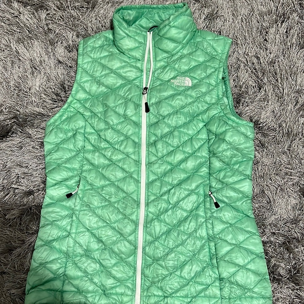mint green “the north face” puffer vest